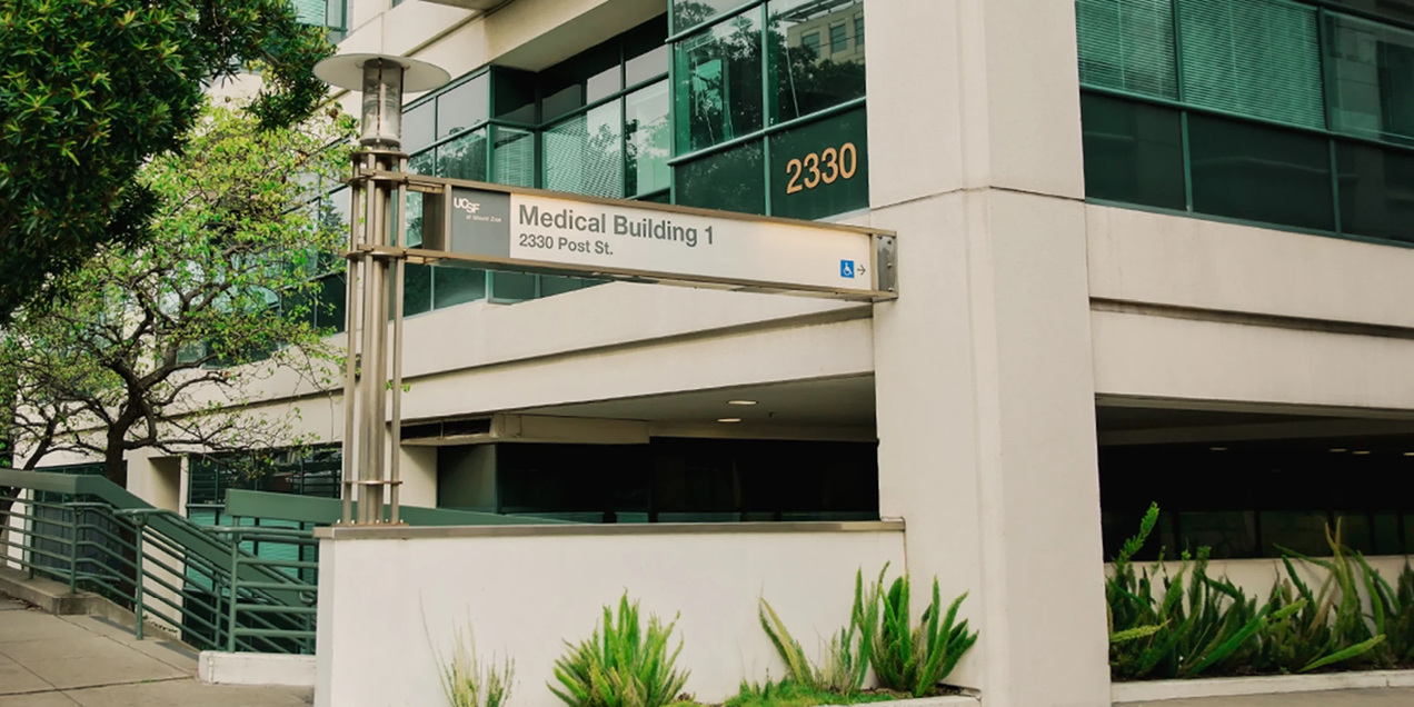 Exterior view of UCSF Medical Building 1 at 2330 Post Street in San Francisco, showing building signage and entrance area.