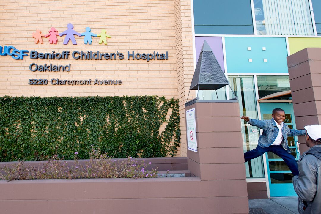 Child playing with father at UCSF Benioff Children's Hospital