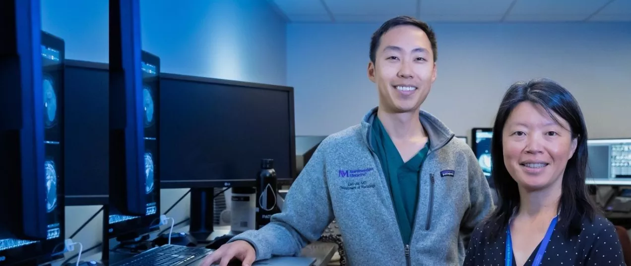 Abdominal Radiologist Dr. Wang reviewing scan with Clinical Fellow Leo Jia.