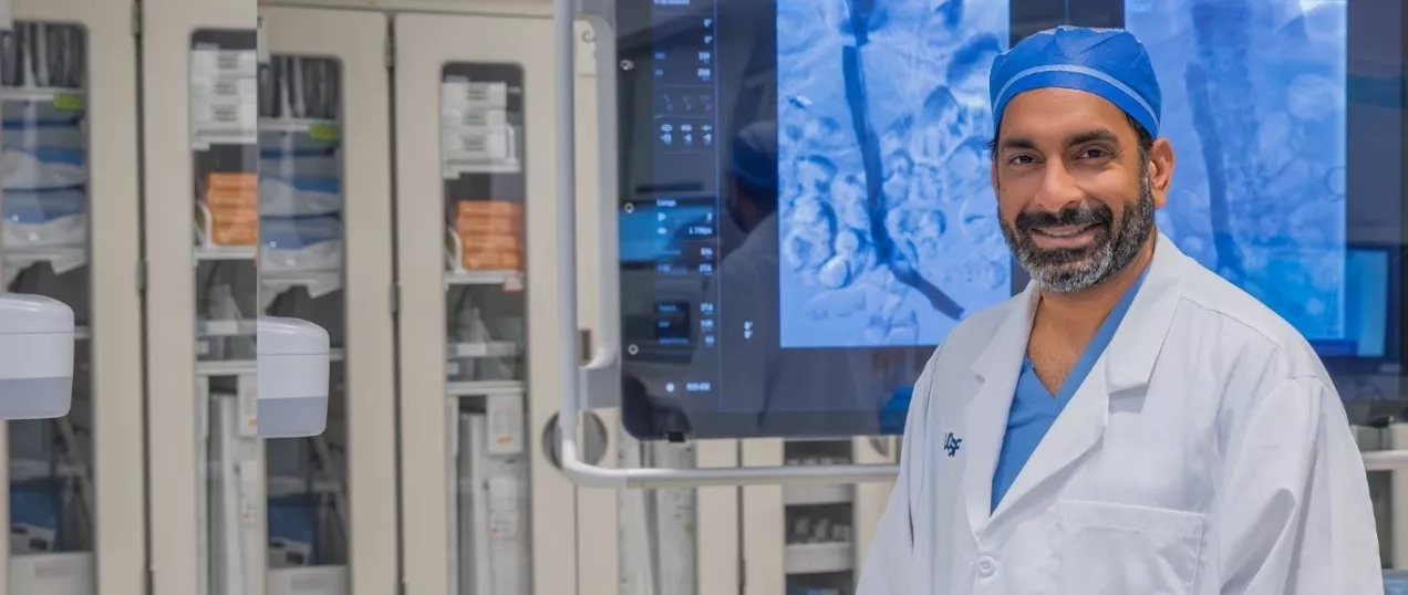 Interventional radiologist smiling at camera 