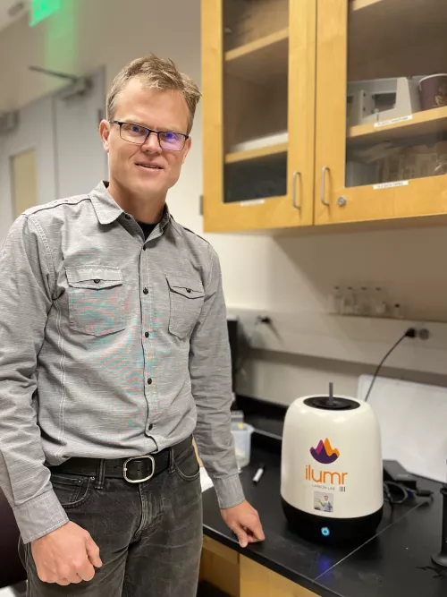 Peder Larson standing in a lab