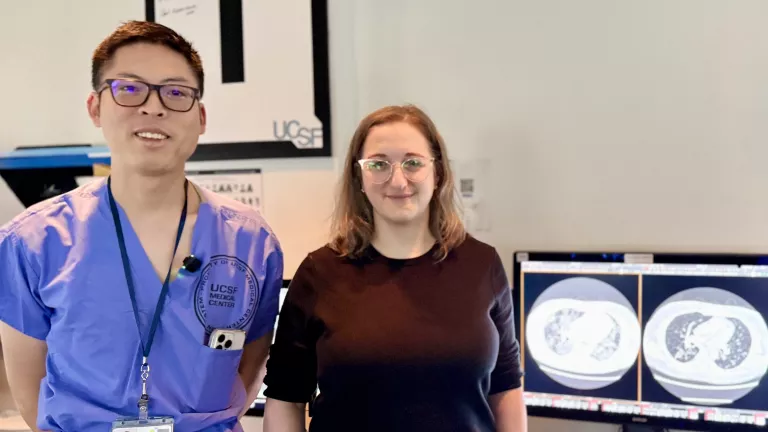 Radiologists reviewing scans in the reading room