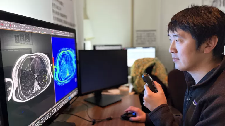 Radiologist reviewing scan