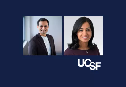 Two professional headshots side by side on a dark blue background with the UCSF logo below. On the left, a smiling man wearing a dark blazer and light shirt stands near a window. On the right, a smiling woman with shoulder-length dark hair wears a purple top and a necklace with a small pendant, photographed against a light background.