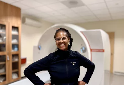 Erika Padilla-Morales in from of an MRI machine