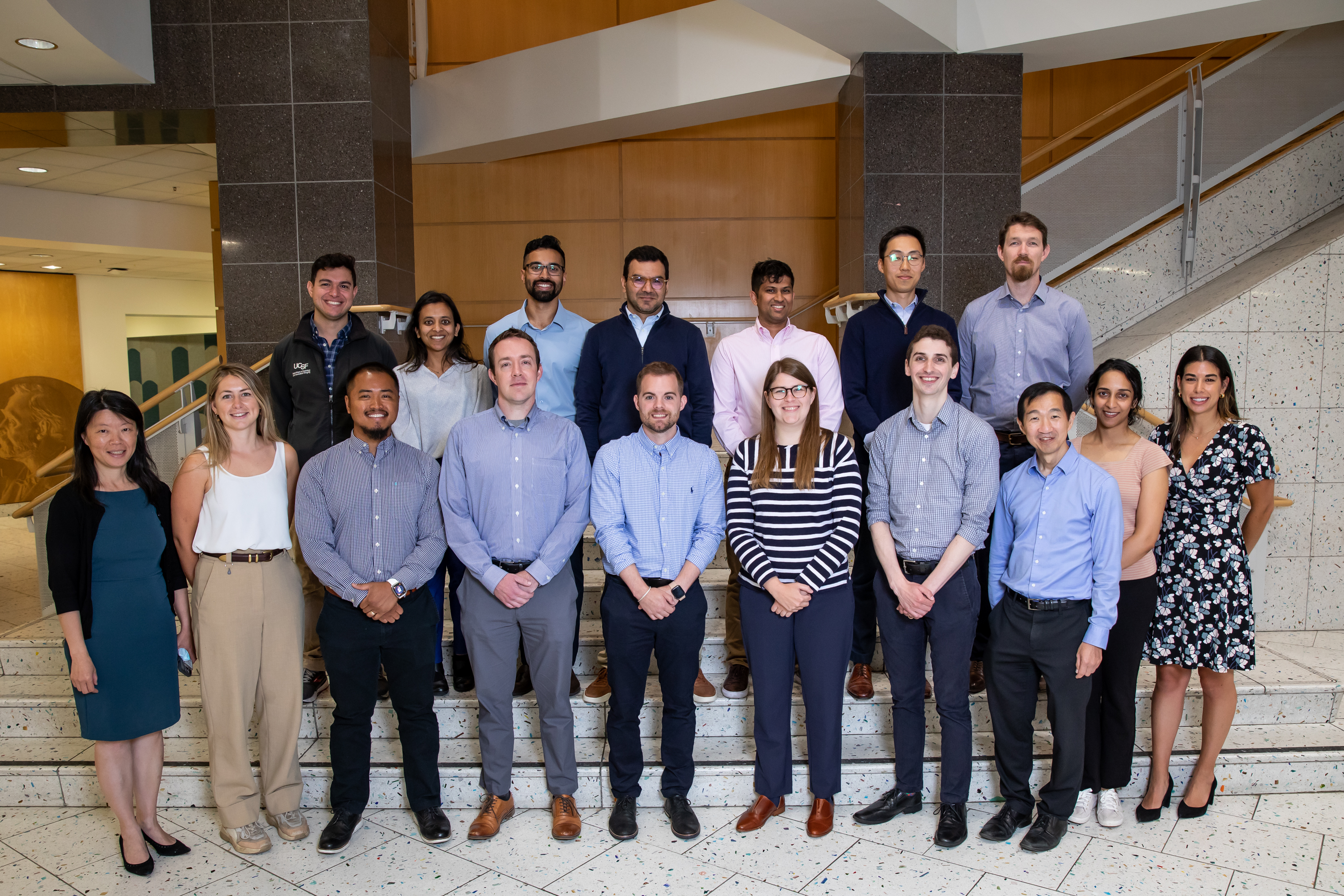 Group photo of the Body Imaging Fellowship team standing on indoor steps.