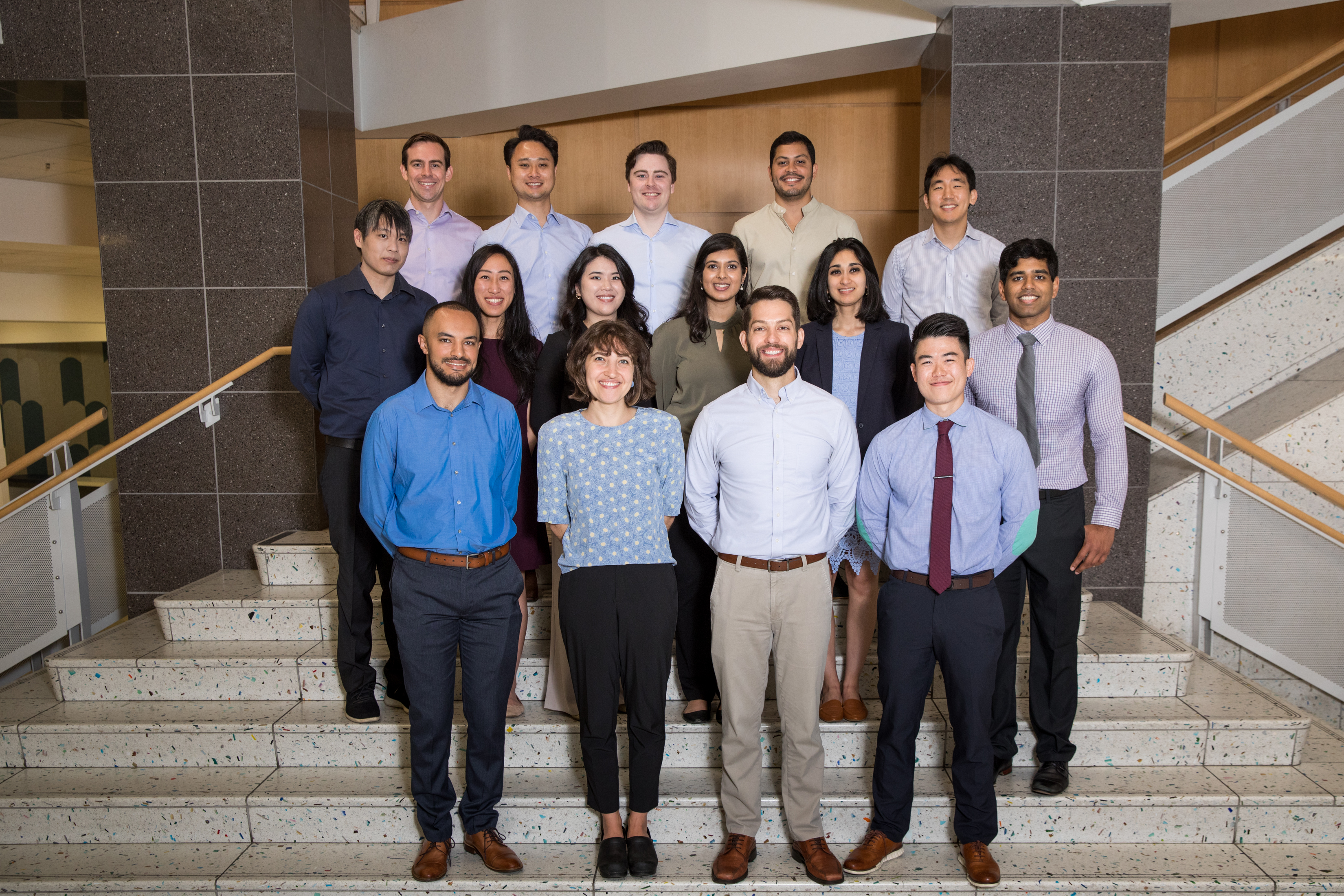 Group photo of the Radiology Residents Class of 2027 standing on indoor steps.
